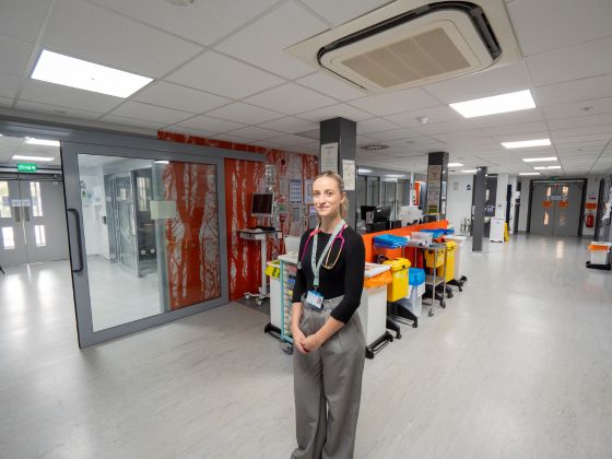 Student doctor stood on a ward