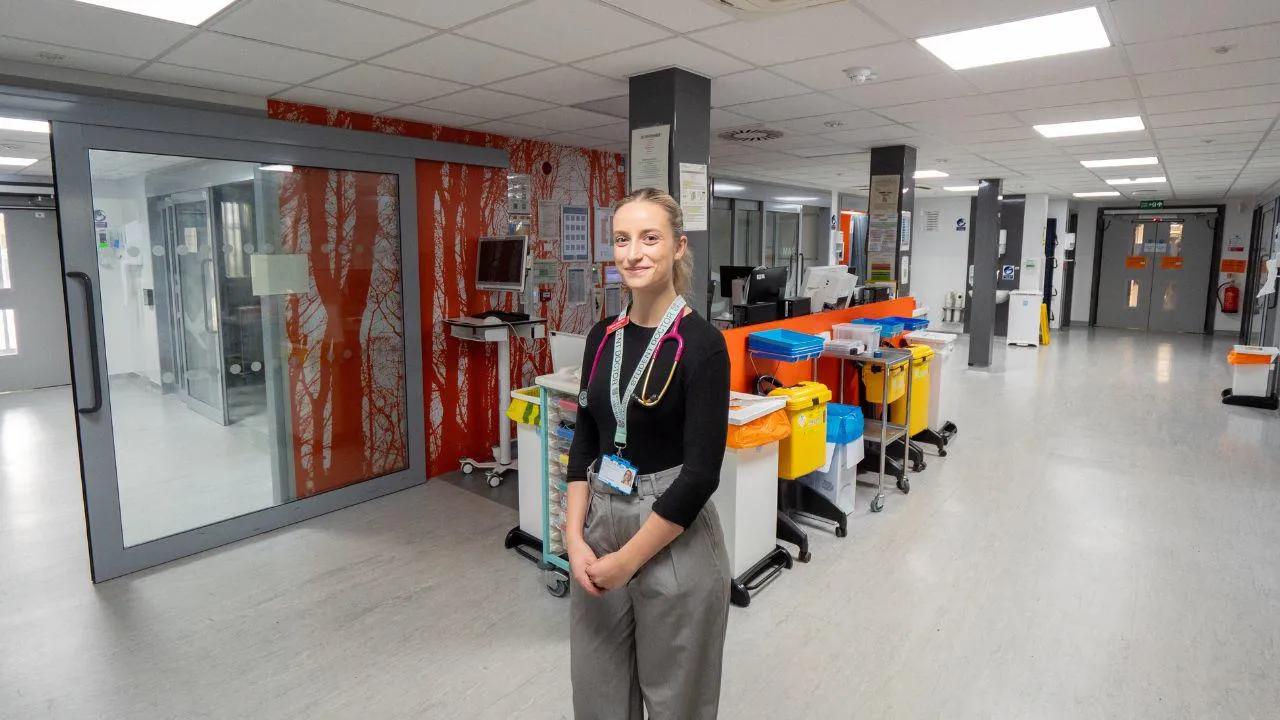 Student doctor standing on a ward