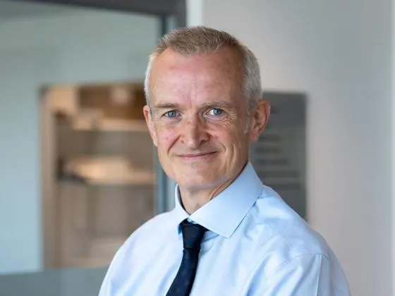 Many standing in office building