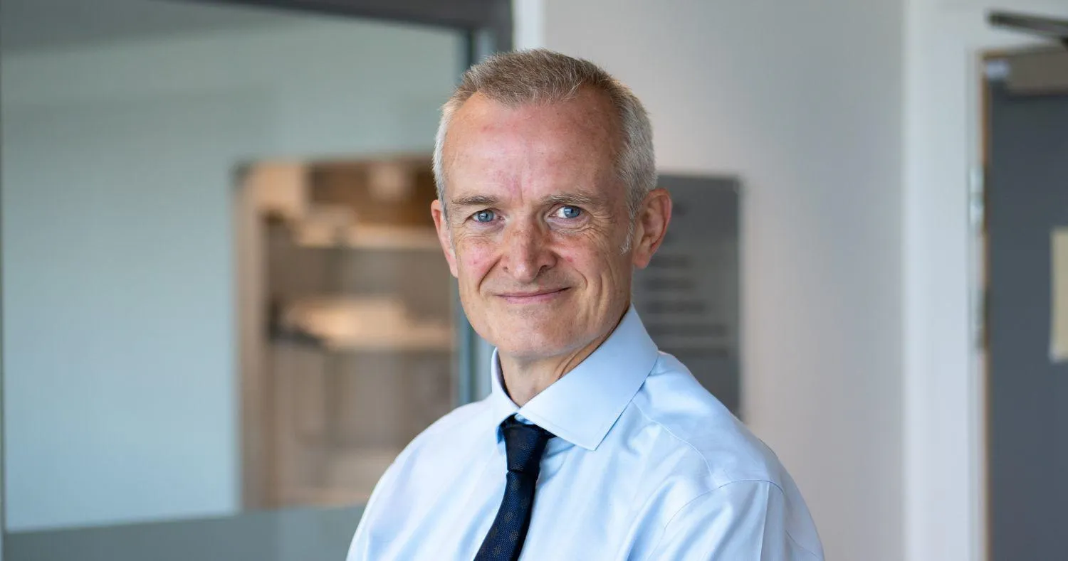 Many standing in office building