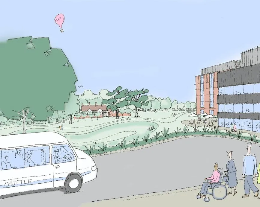 Illustrative view of the hospital entrance area showing a shuttle bus on a two-way road, pedestrians including a wheelchair user on a footway, landscaped green space with trees and planting, the hospital building to the right, and Hardwick Manor visible i
