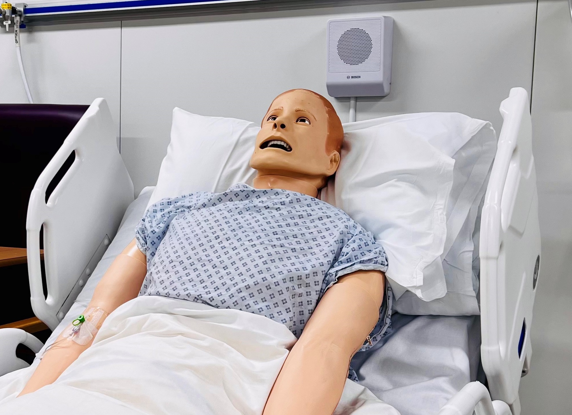 Robot patient in a bed in the clinical skills unit 