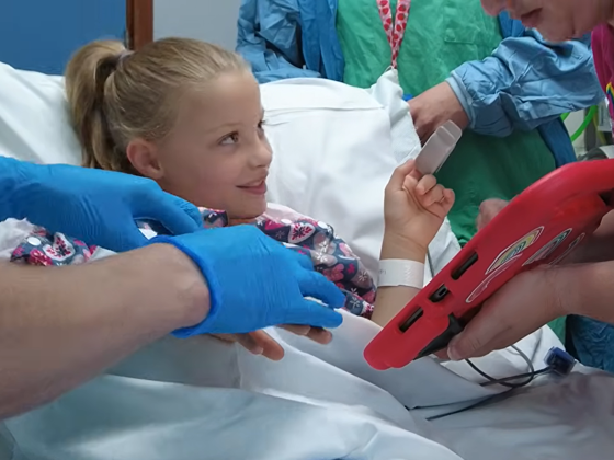 A child in a hospital bed