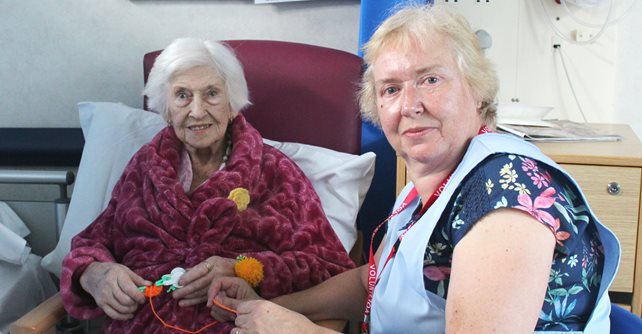 Patient Mair Whitby and Jennie Gatley, craft volunteer on ward G4