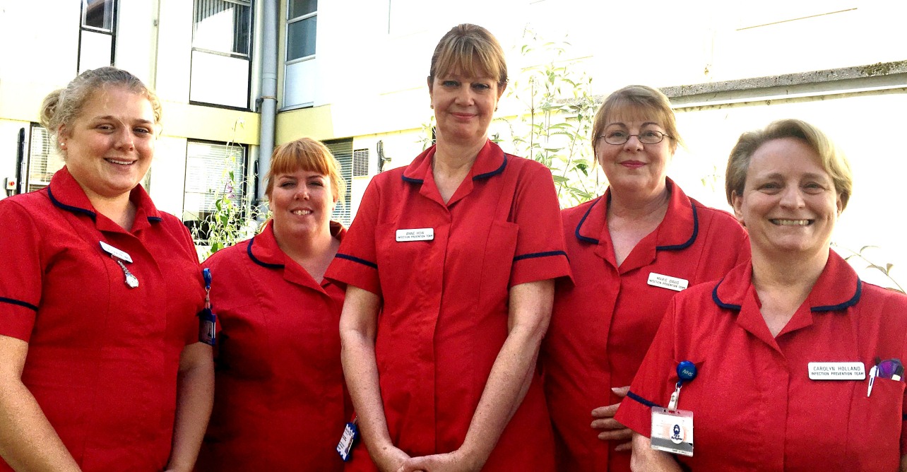 Anne How, lead infection prevention nurse (centre) and the infection prevention team