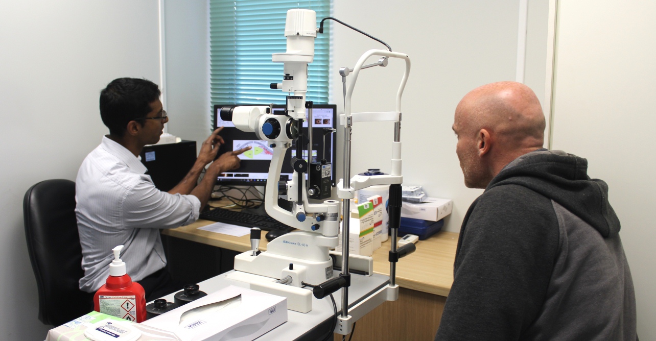 Gayon Weli, Newmedica optometrist with patient, Gavin