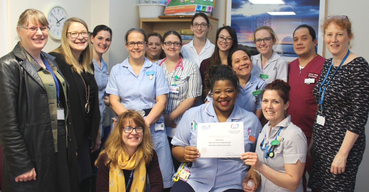 The team on ward G4 receive their Suffolk Family Carers silver award at West Suffolk Hospital