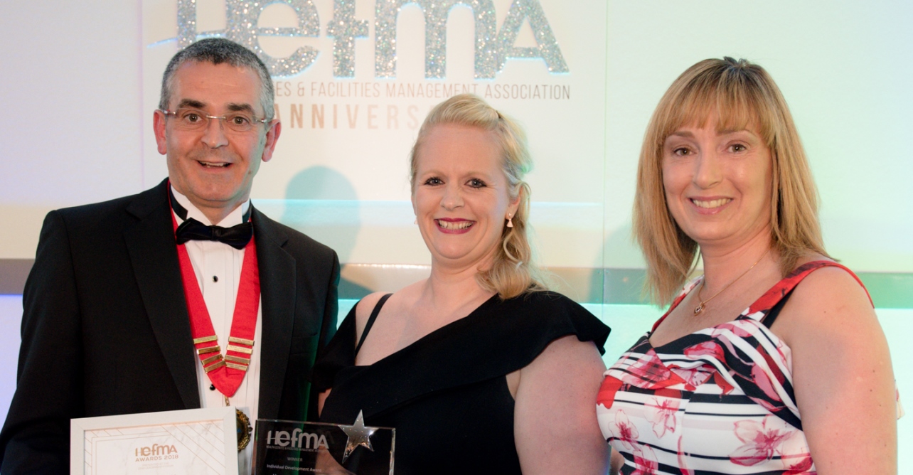 Hannah (centre) receiving her award from Jonathan Stewart, HEFMA national chairman, and Lisa Cresswell, meridian health award sponsor.