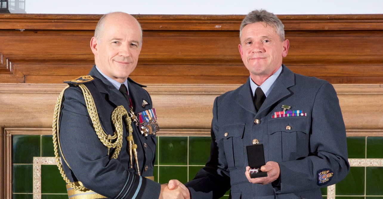 RAF presenting Robert Ley MBE with his meritorious service medal