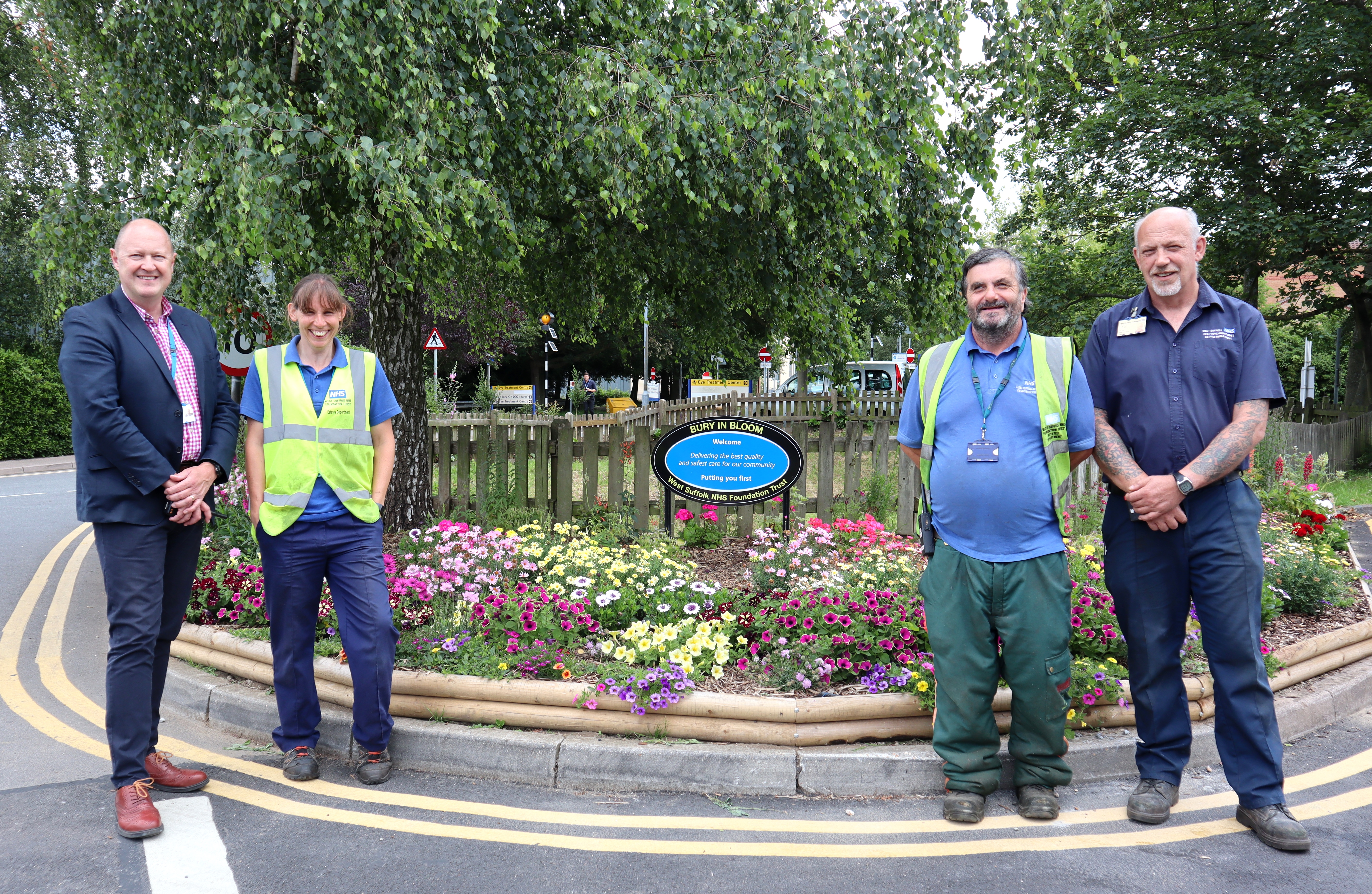 L-R Gary Stannard, estates operations maintenance manager, Sarah Dance, gardener, David Cracknell, gardener, and Ian Purt, builder - the WSFT team behind the blooms