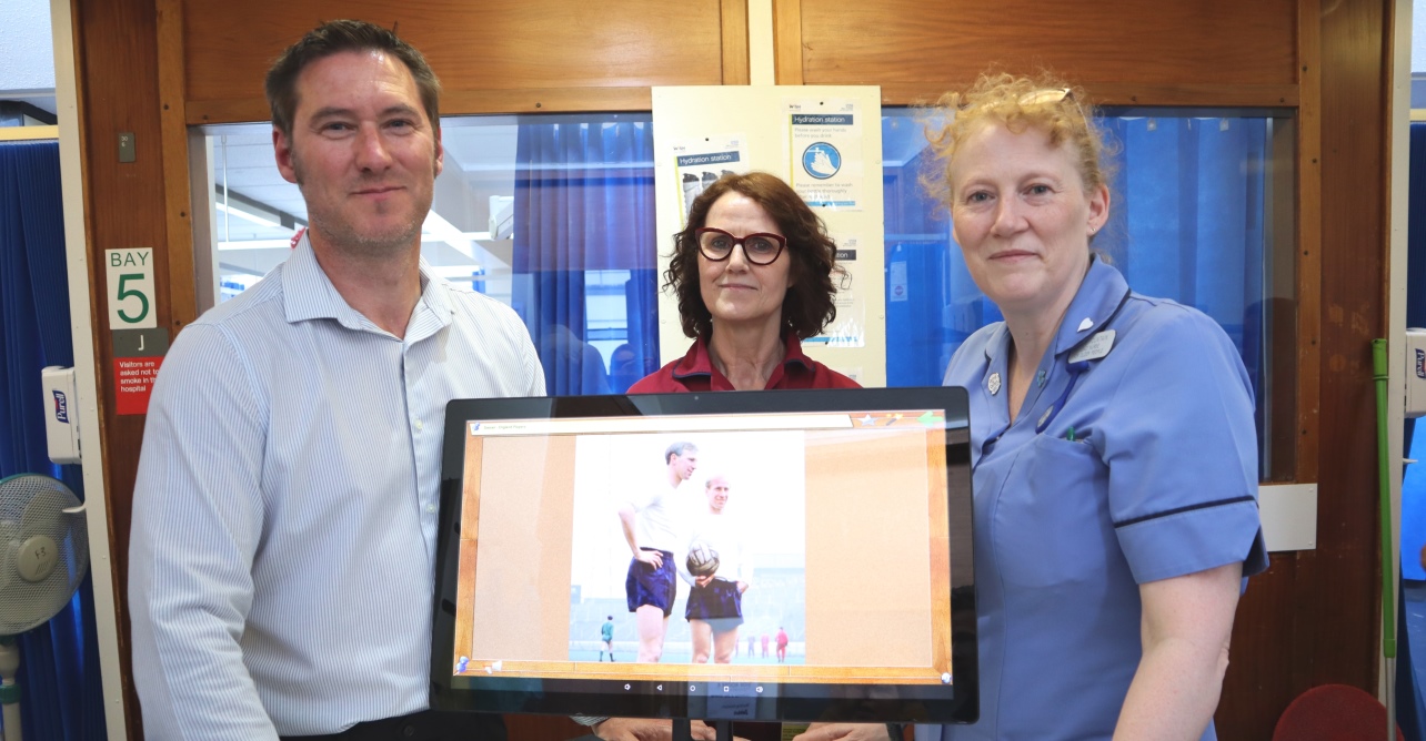 Left to right: Helen Clarke, senior staff nurse, storyteller volunteer Joshua Harris, and Glynis Hart, nursing assistant at the WSFT King Suite wing of Glastonbury Court care home