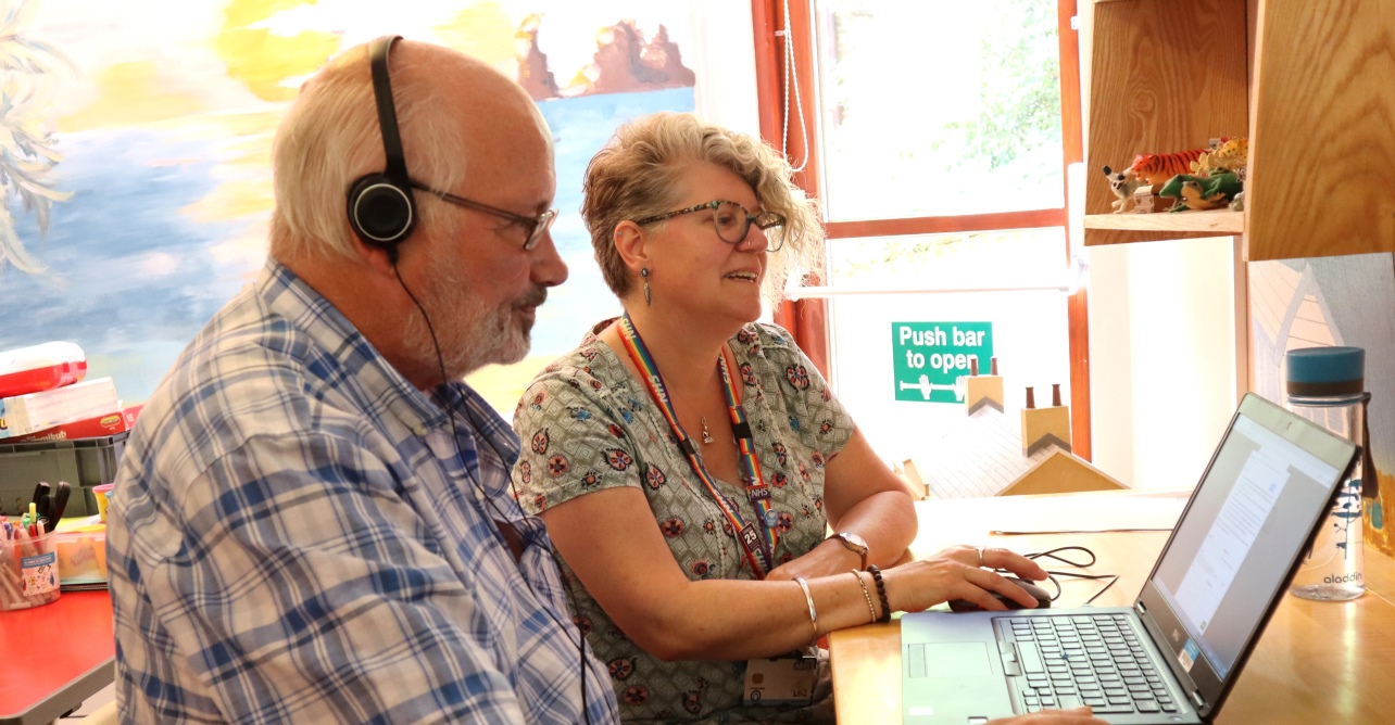 David (left) and Laura Wilkes working together to record David’s voice and phrases ready to share with friends and loved ones in the future. 