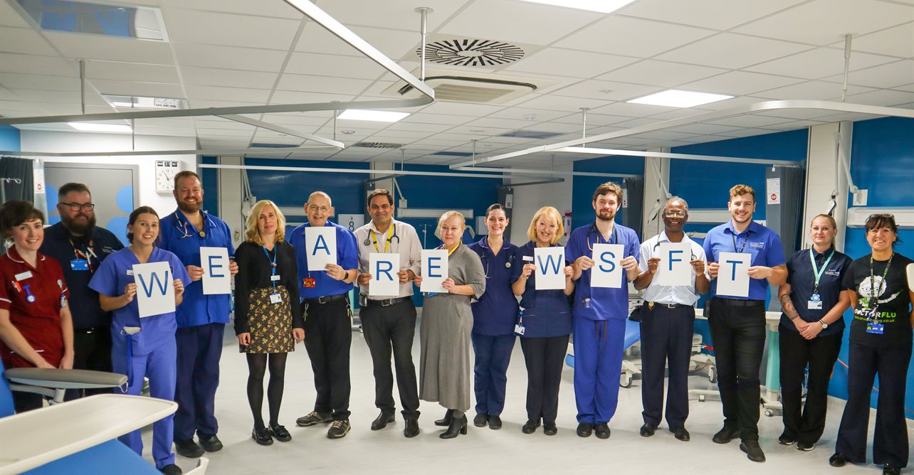 Staff celebrate the latest Friends and Family Test result