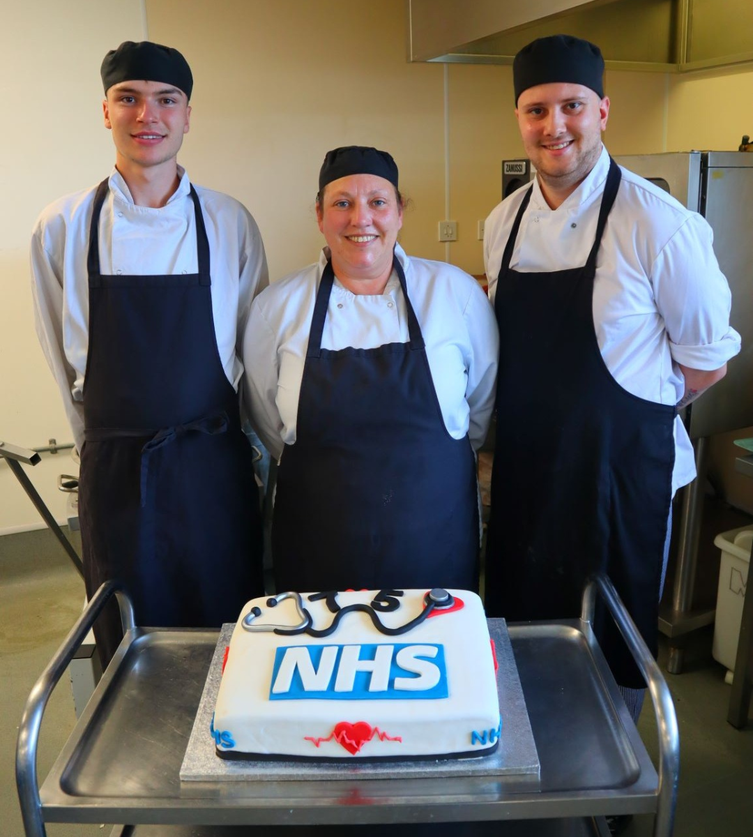 Assistant head chef Charlotte Crack with apprentice chefs Connor Gutsell and Harry Sandy.