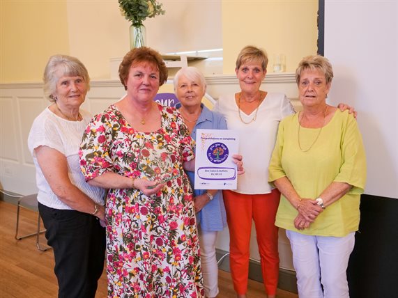 Elite Cakes and Buffets team, recipient of the Most Dough Raised Award