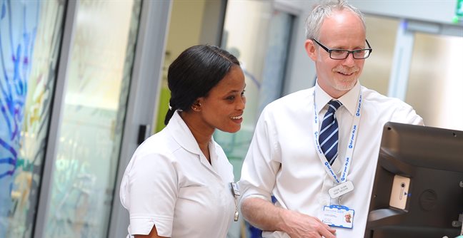 Dr Stephen Dunn, right, is to step down